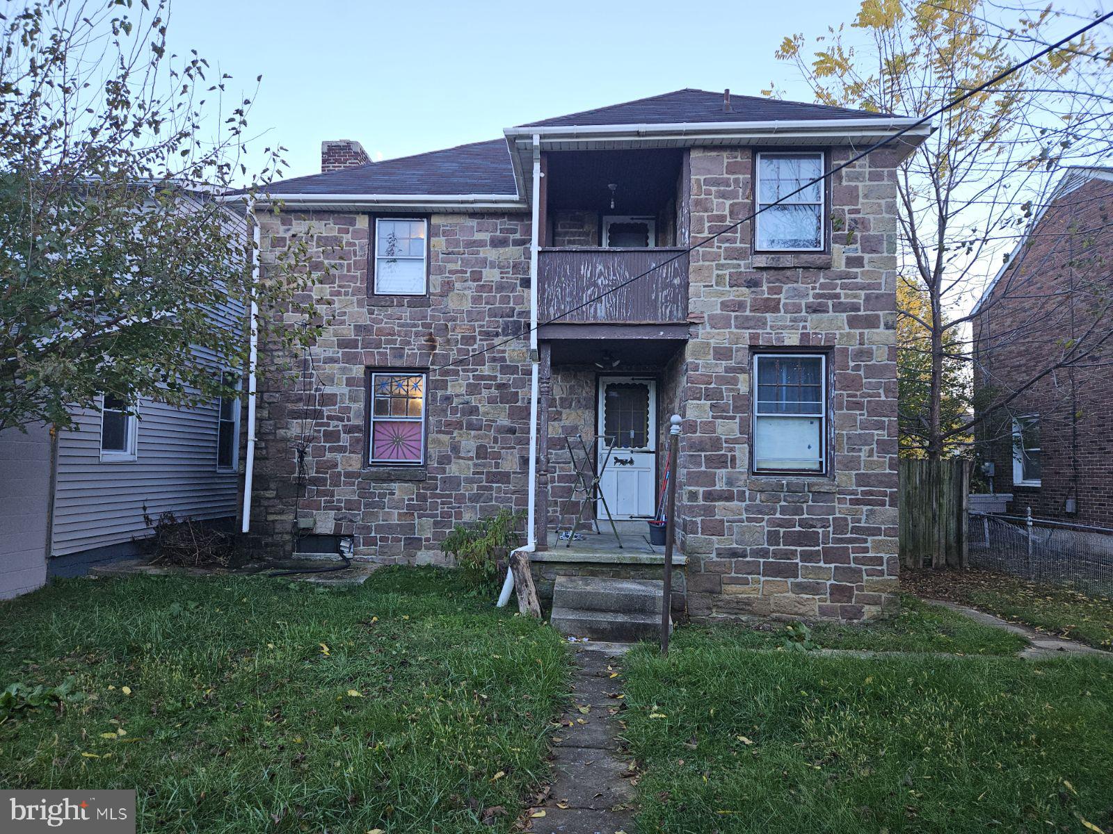 977 Edison Street York, PA 17403 - Photo 2 of 6 a front view of a house with garden