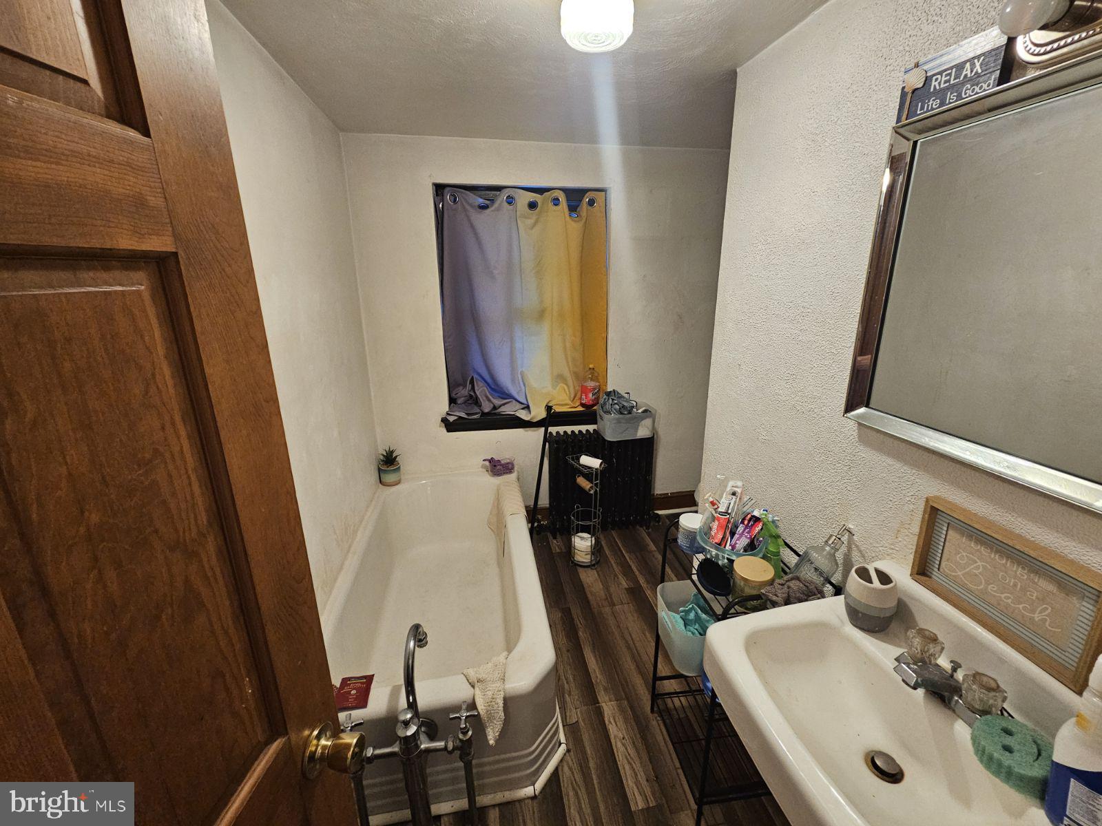 977 Edison Street York, PA 17403 - Photo 6 of 6 a bathroom with a sink vanity and mirror