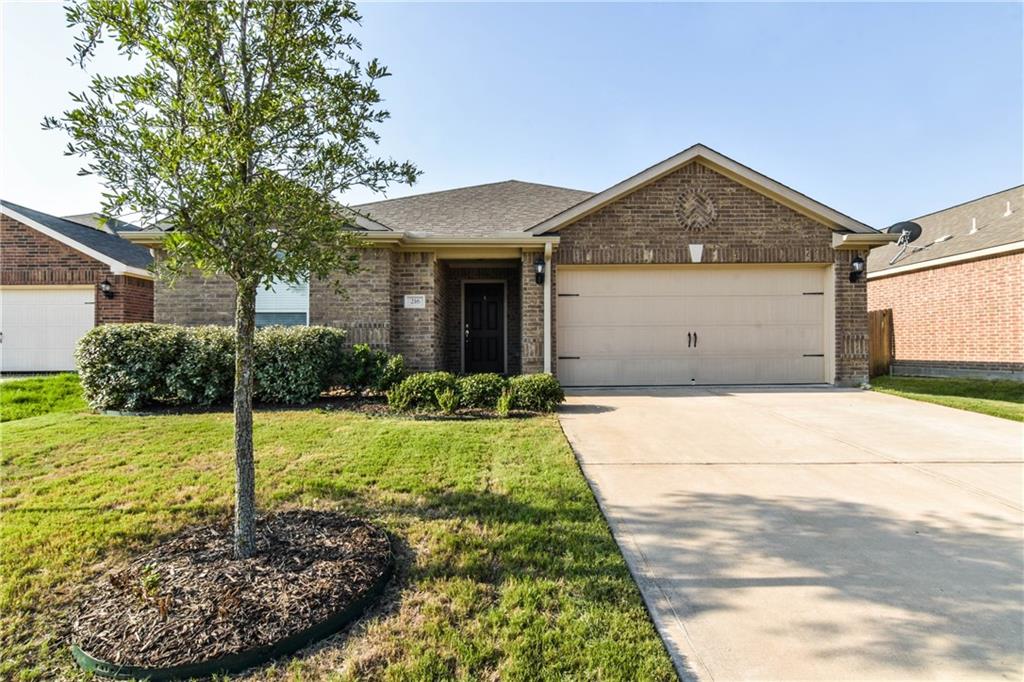 216 Mill Street Anna, TX 75409 - Photo 1 of 22 a house view with a garden space