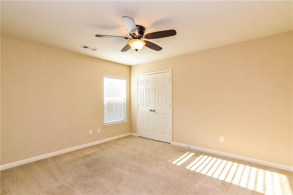 216 Mill Street Anna, TX 75409 - Photo 15 of 22 a view of a livingroom with a ceiling fan and window