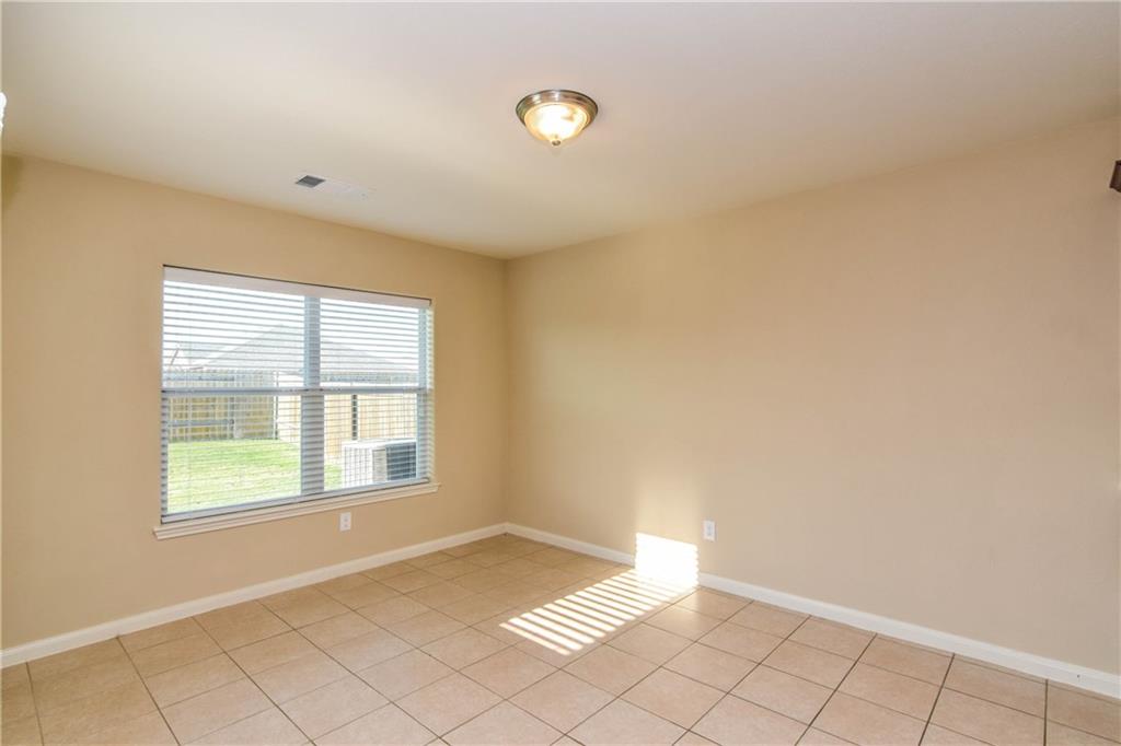 216 Mill Street Anna, TX 75409 - Photo 17 of 22 a view of an empty room with window