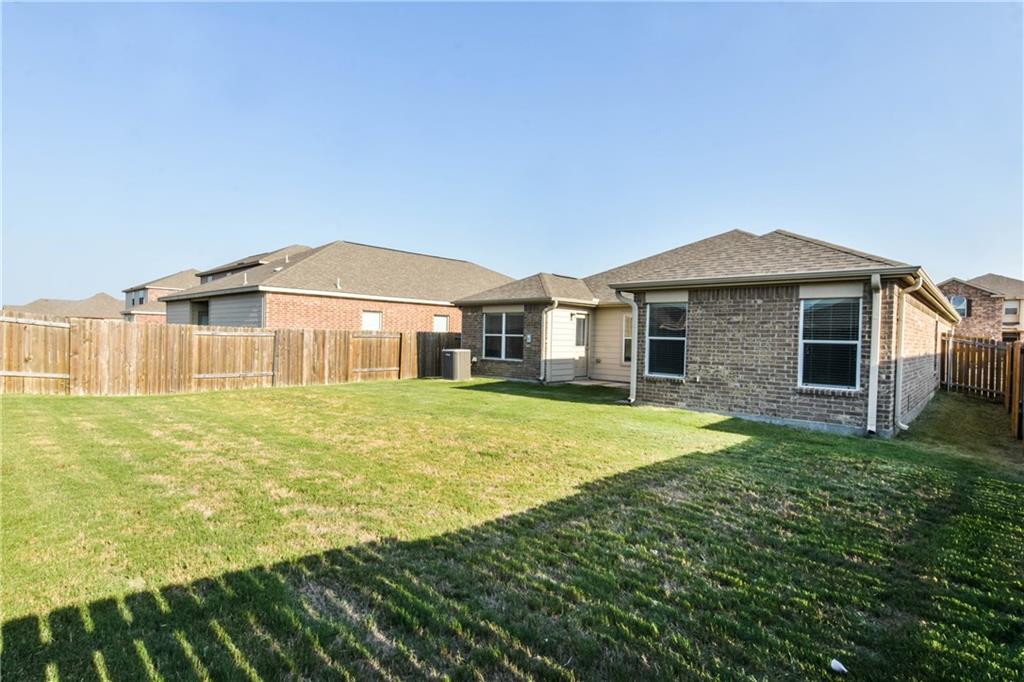 216 Mill Street Anna, TX 75409 - Photo 21 of 22 a front view of a house with a garden