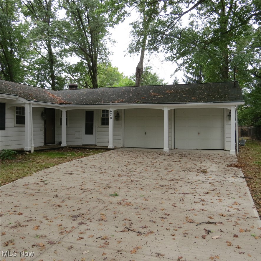 430 High Meadow Road Amherst, OH 44001 - Photo 2 of 29 View of front facade with a garage