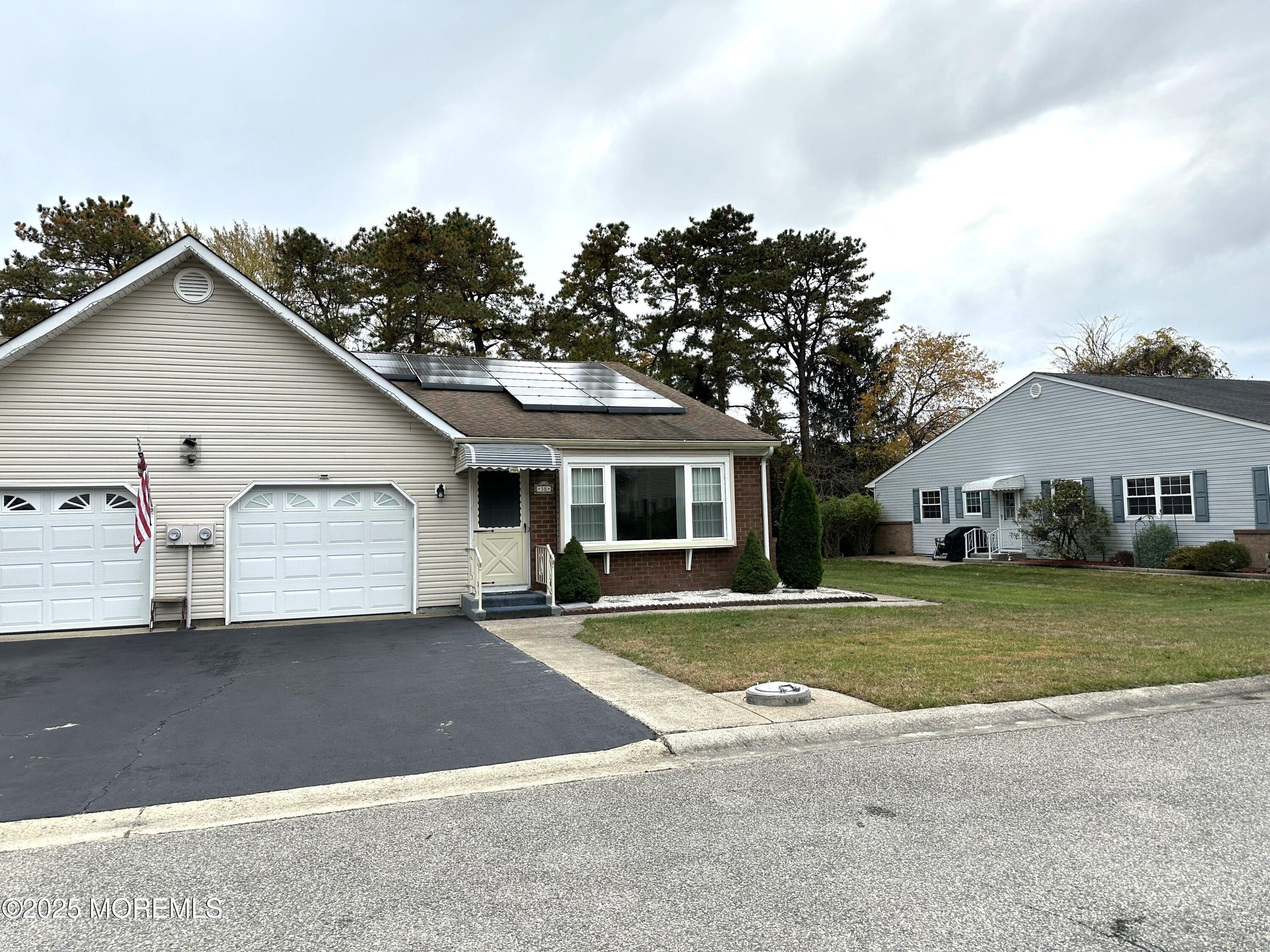 3 B Drake Street, Unit 53 Whiting, NJ 08759 - Photo 2 of 25 a view of a house with a outdoor space and a yard