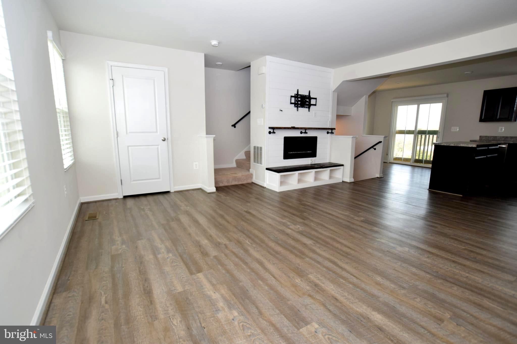 2840 Farzi Circle Locust Grove, VA 22508 - Photo 9 of 21 a view of living room with furniture and flat screen tv