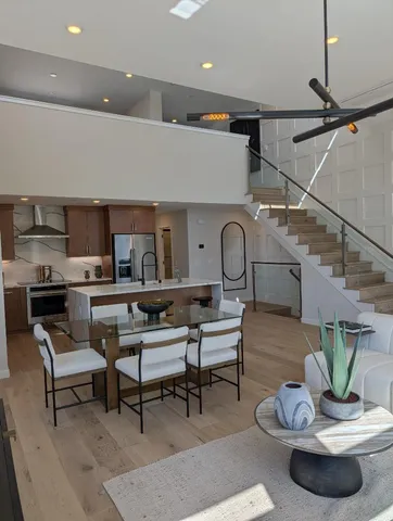 a view of a room with gym equipment and a window