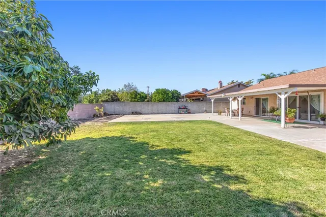 a house view with a garden space