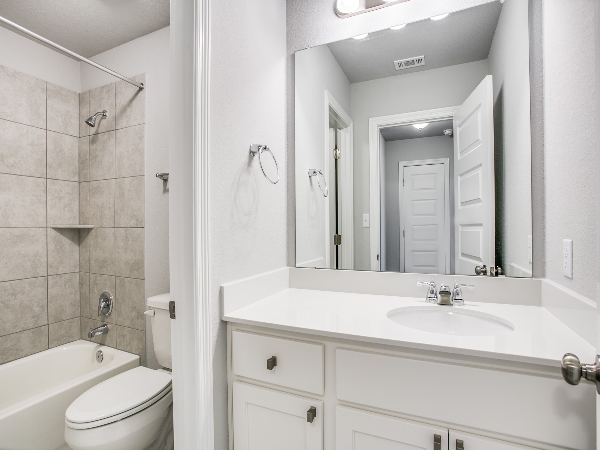 508 Rearing Mare Pass Georgetown, TX 78626 - Photo 12 of 26 Full bathroom with toilet, vanity, and tub / shower combination