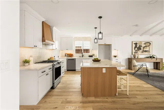 a living room with furniture fireplace and flat screen tv