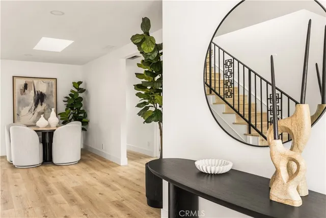 a view of entryway with wooden floor