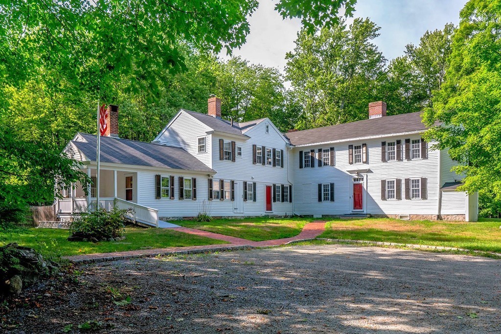 13 Spaulding Road Shirley, MA 01464 - Photo 1 of 27 a view of a house with a garden and swimming pool