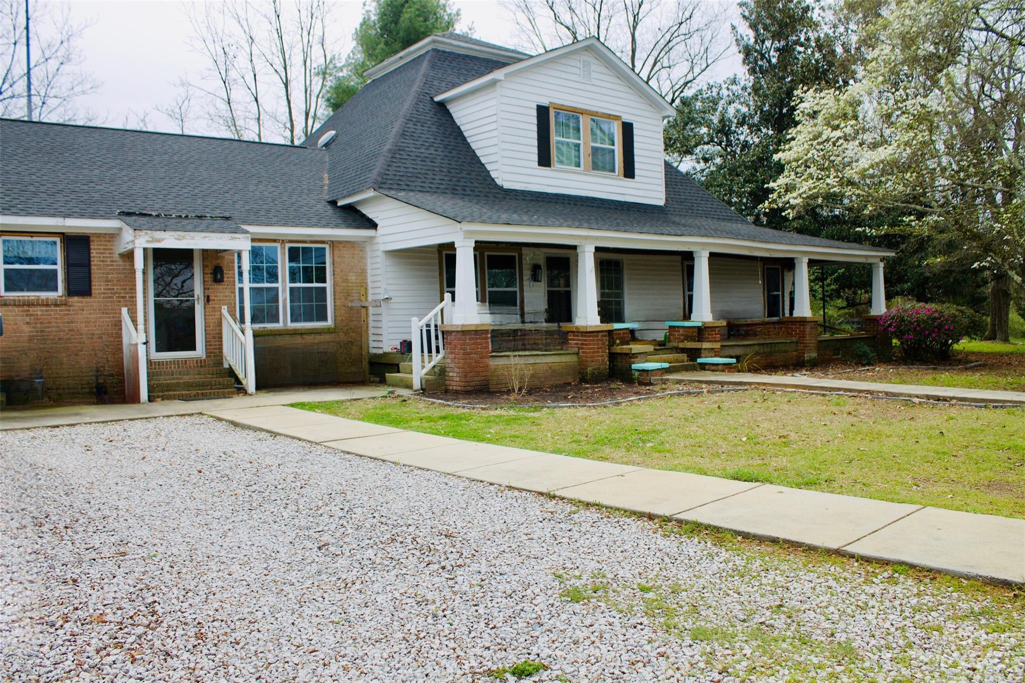 5880 Tabernacle Road Lancaster, SC 29720 - Photo 2 of 22 a front view of a house with swimming pool