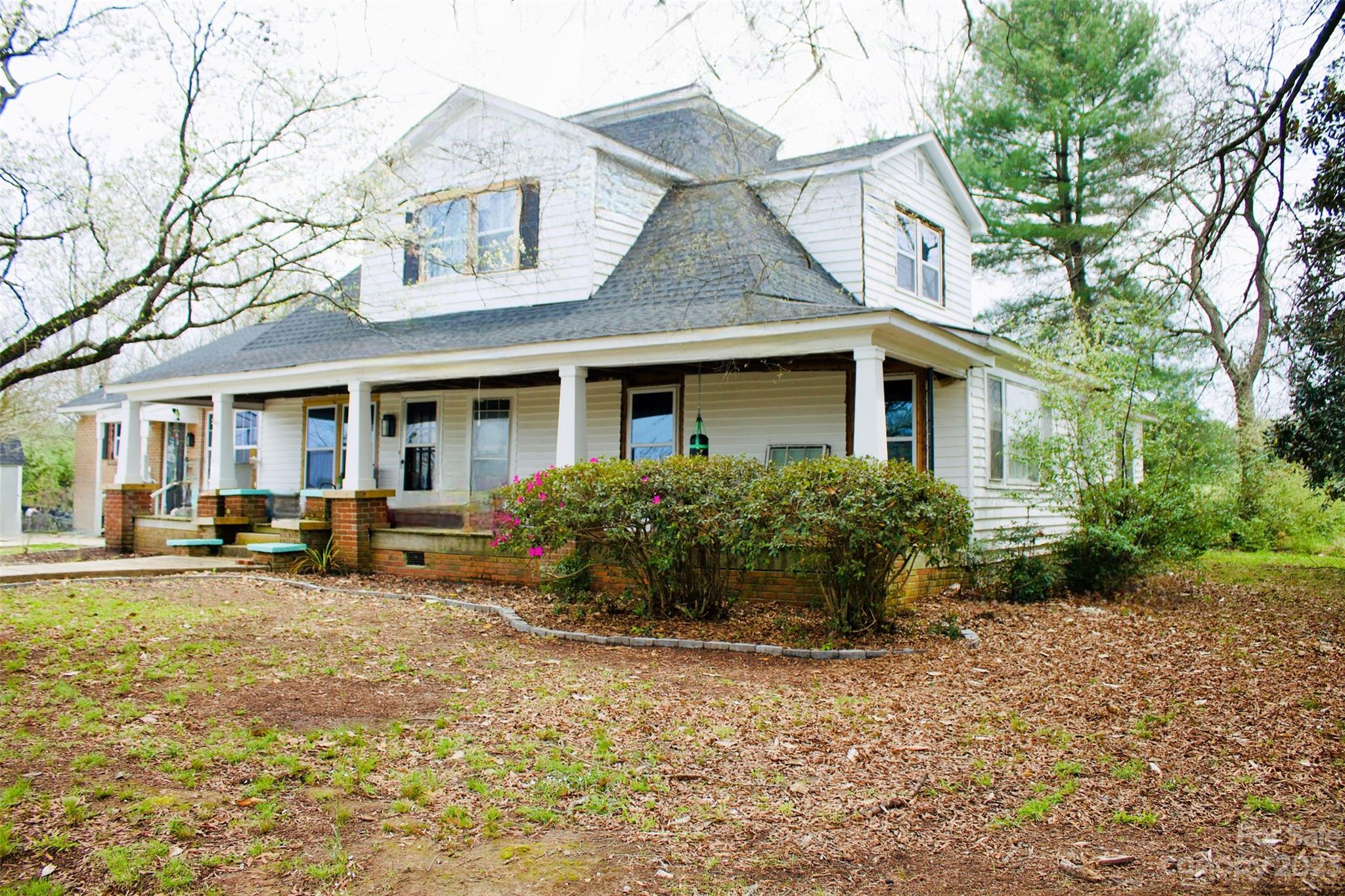 5880 Tabernacle Road Lancaster, SC 29720 - Photo 3 of 22 a front view of a house with garden and porch