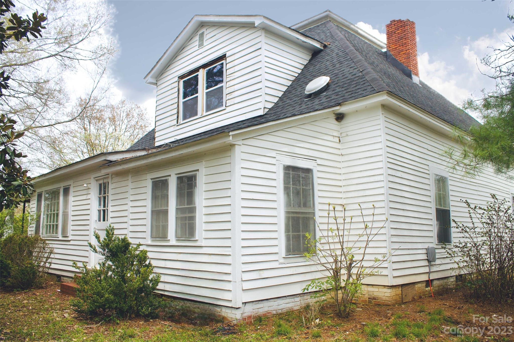 5880 Tabernacle Road Lancaster, SC 29720 - Photo 6 of 22 a view of a house with a yard and garage