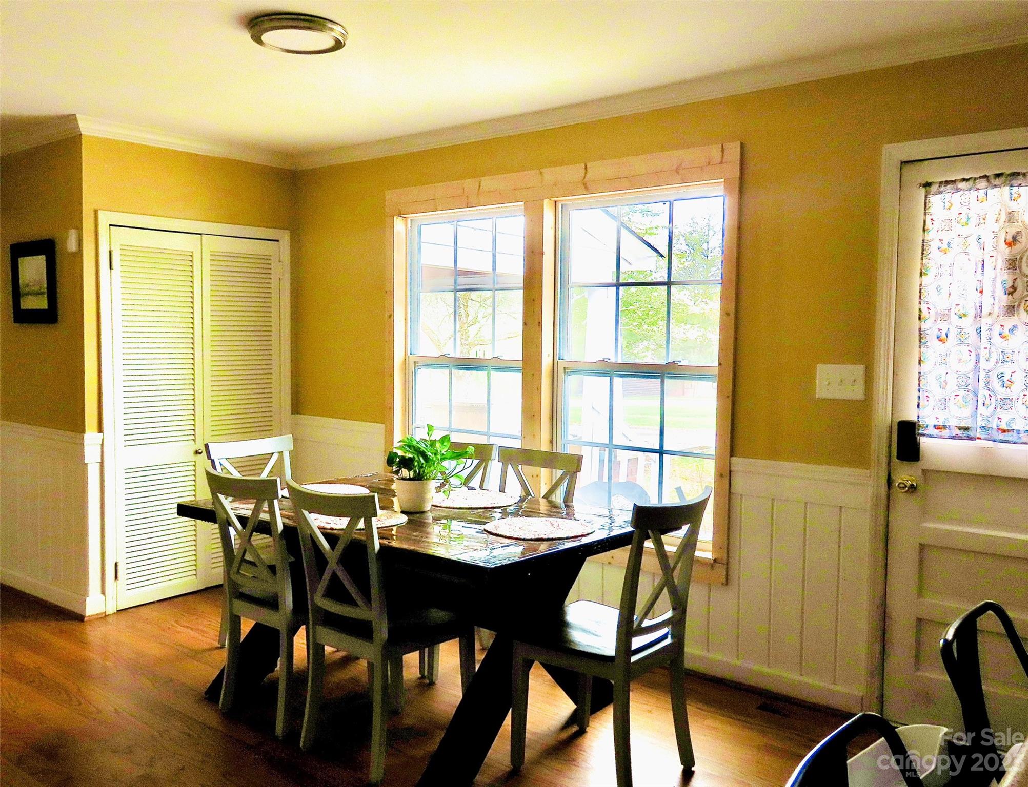 5880 Tabernacle Road Lancaster, SC 29720 - Photo 8 of 22 a view of a dining room with furniture and wooden floor