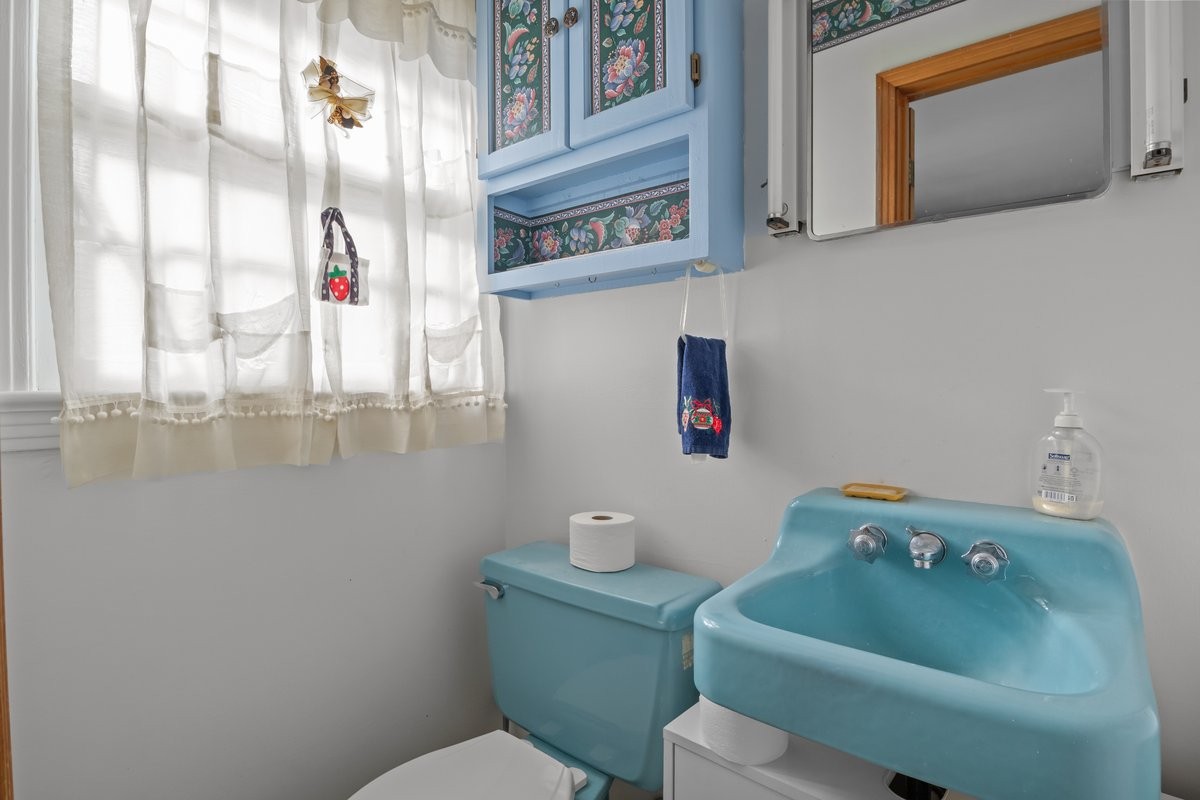 2138 River Road Clarksville, TN 37040 - Photo 12 of 27 a bathroom with a sink and a mirror