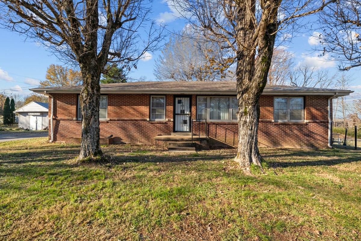 2138 River Road Clarksville, TN 37040 - Photo 2 of 27 a view of a house with backyard porch and sitting area