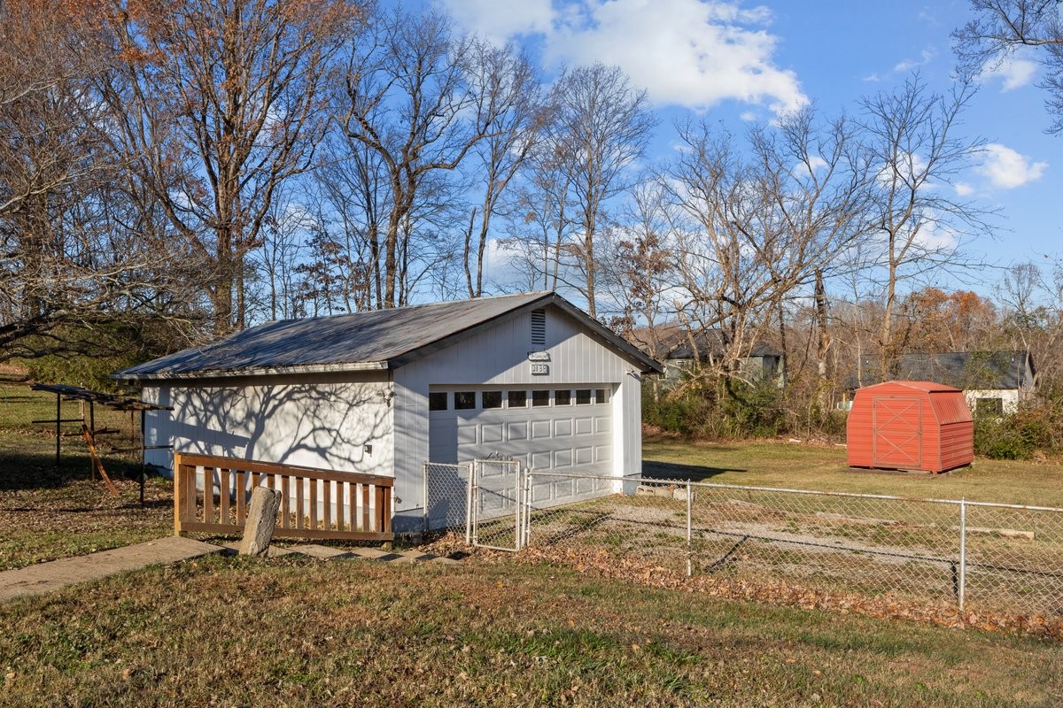 2138 River Road Clarksville, TN 37040 - Photo 22 of 27 a front view of a house with garden