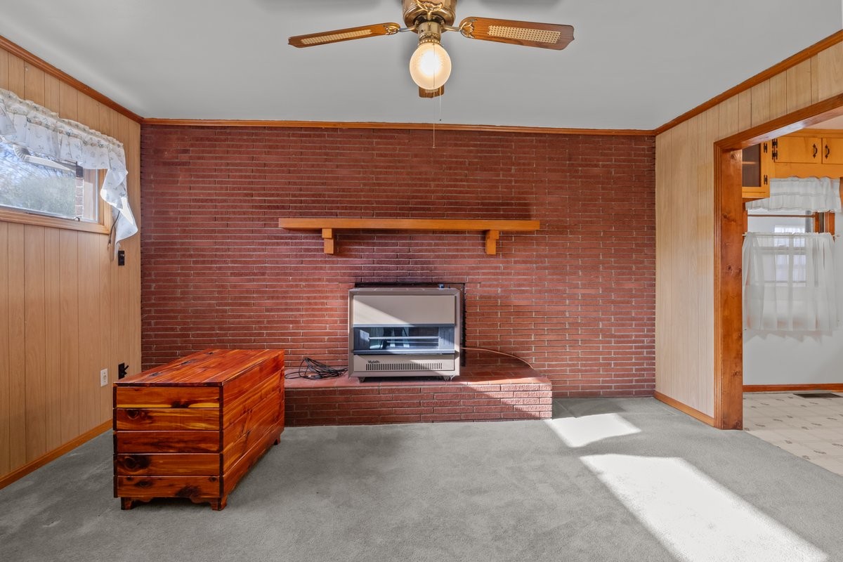 2138 River Road Clarksville, TN 37040 - Photo 8 of 27 a living room with furniture and a fireplace