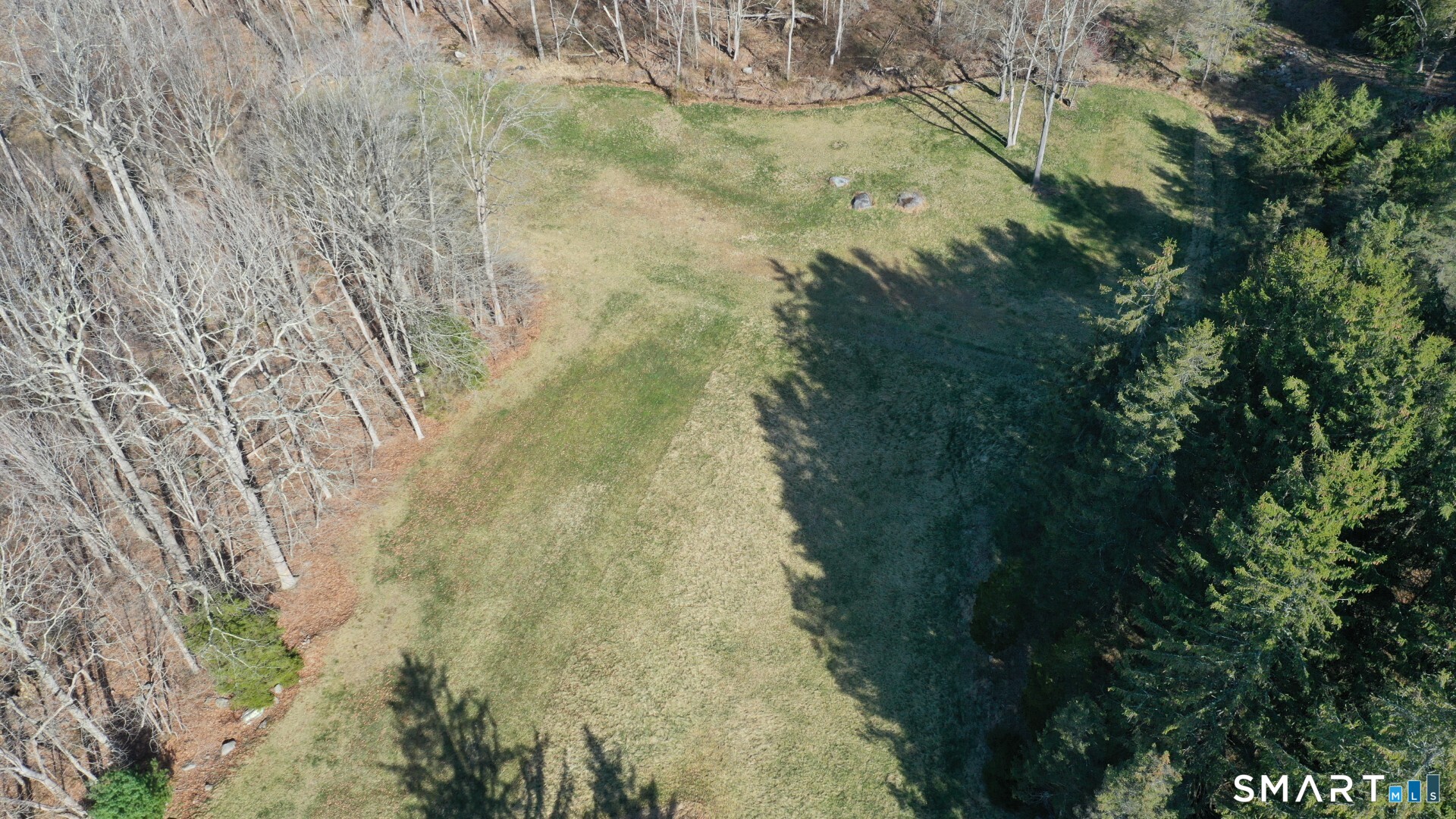 441 Opening Hill Road Madison, CT 06443 - Photo 13 of 33 a aerial view of a house with a yard