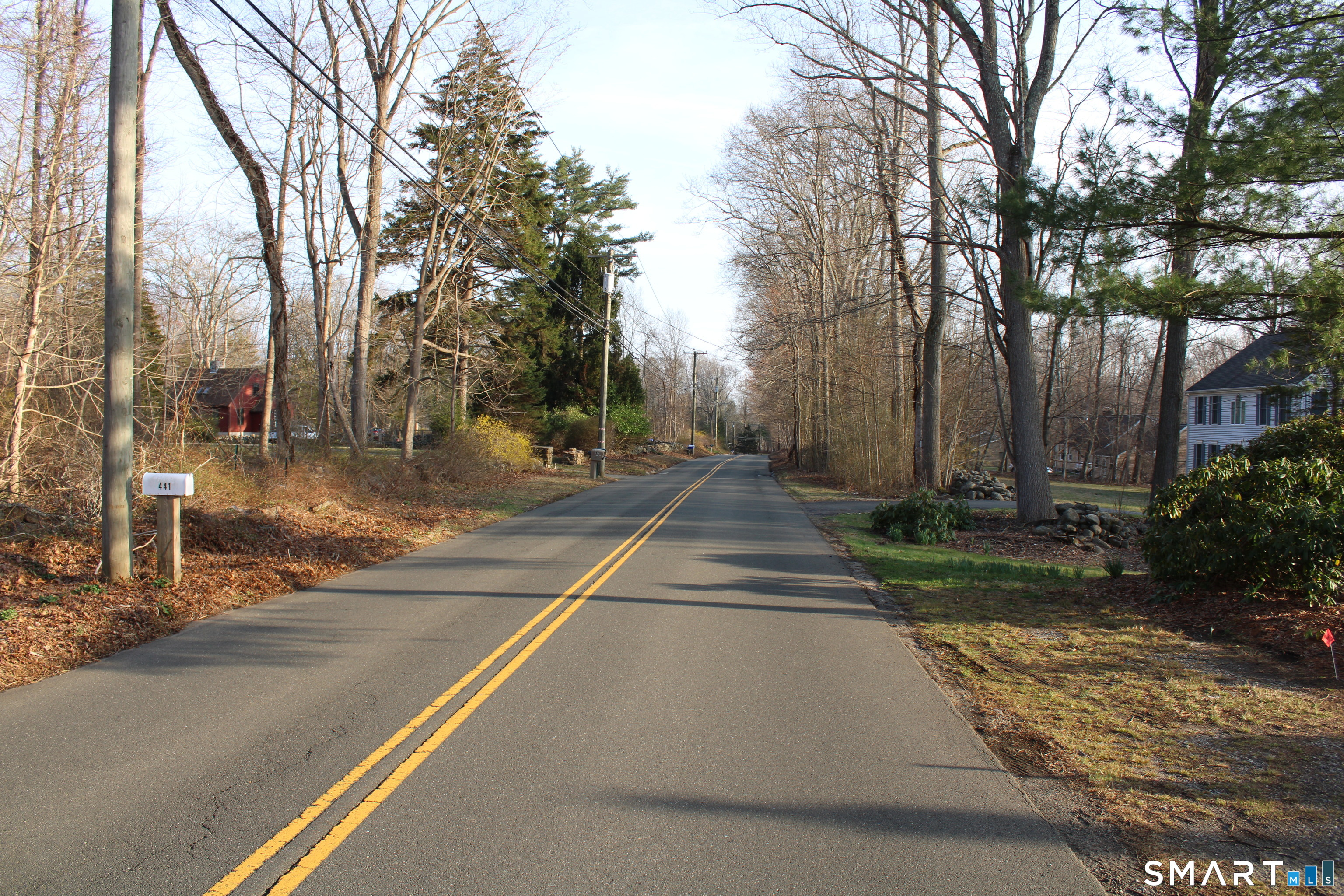 441 Opening Hill Road Madison, CT 06443 - Photo 32 of 33 a view of a street with houses on both side