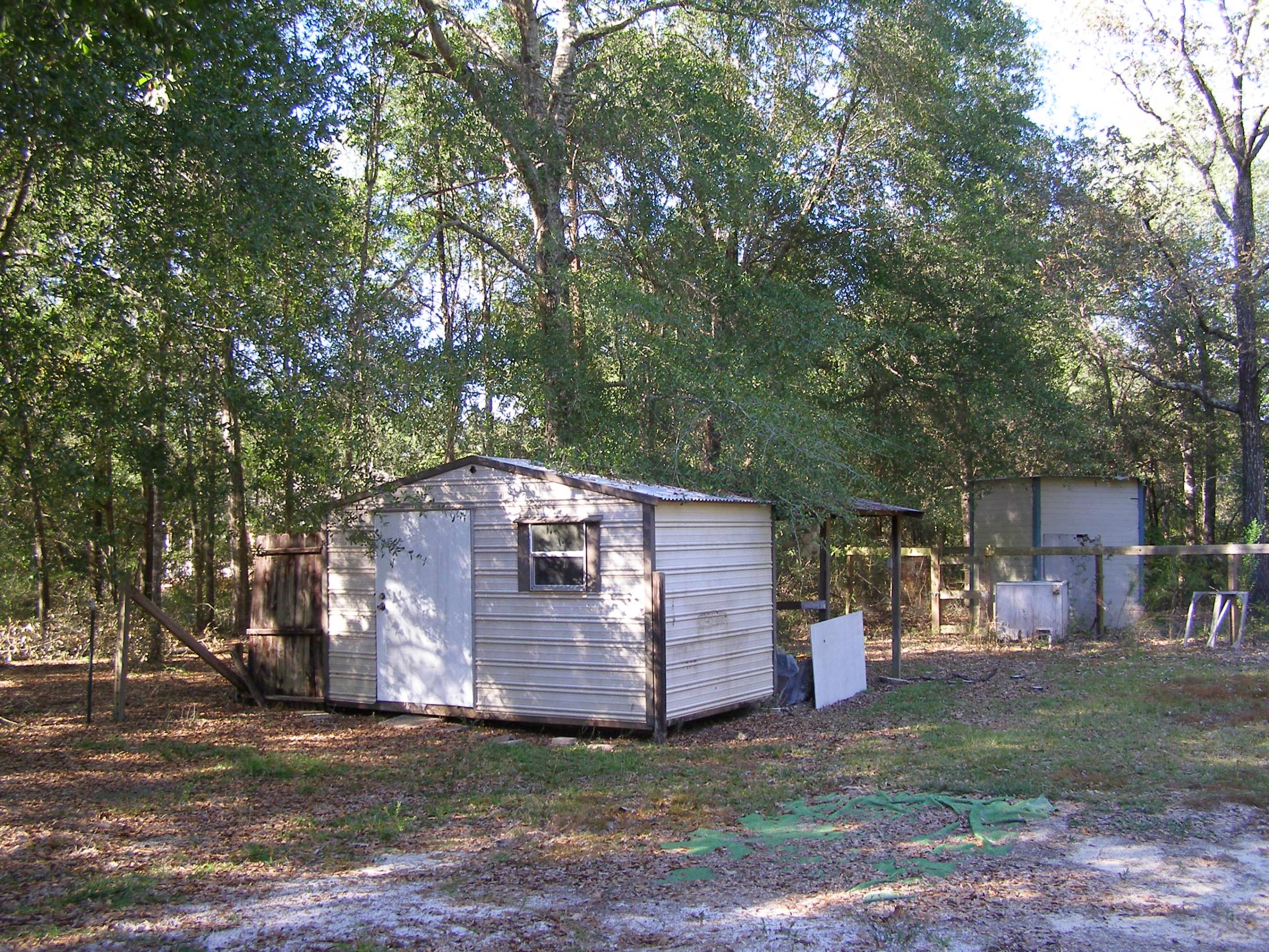 4263 Poverty Creek Road Crestview, FL 32539 - Photo 5 of 13 a view of a house with a yard