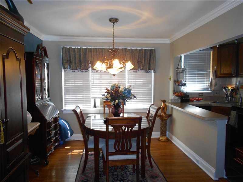 417 Olympia Road Pittsburgh, PA 15211 - Photo 10 of 25 Dining Room. Dining Area with Large Window and Open into Kitchen makes it Light and Bright