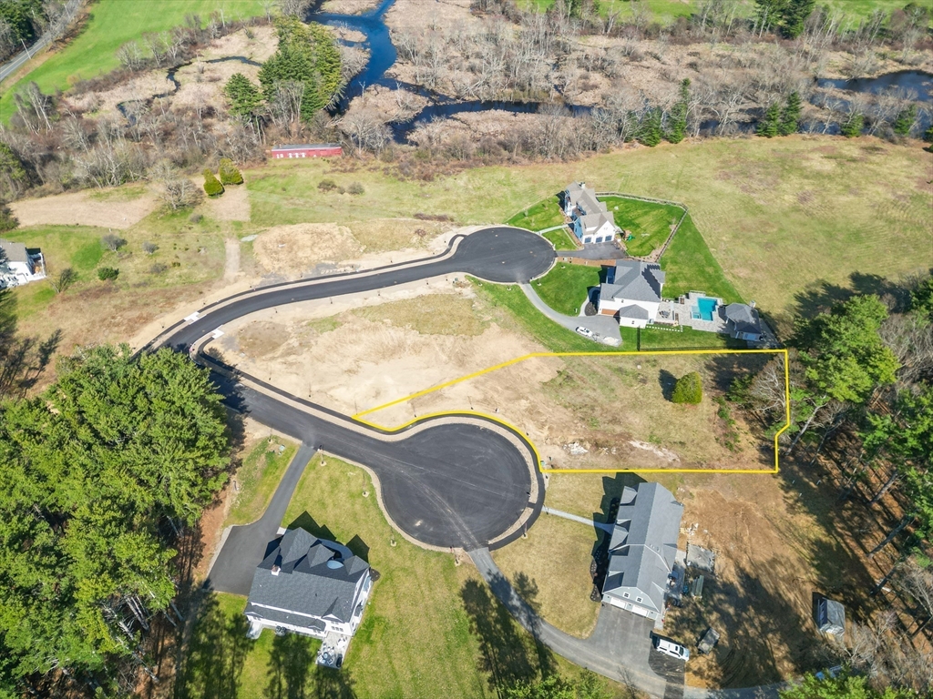 4 Ruby Circle Topsfield, MA 01983 - Photo 3 of 9 an aerial view of a house with outdoor space