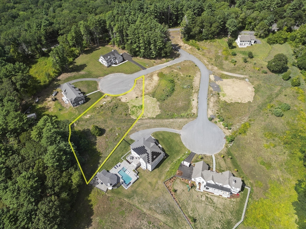 4 Ruby Circle Topsfield, MA 01983 - Photo 6 of 9 an aerial view of a house with swimming pool and outdoor seating