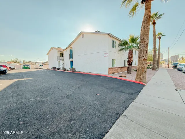 a backyard of a house with seating space