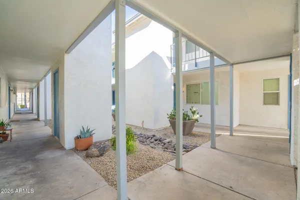 a backyard of a house with a garage