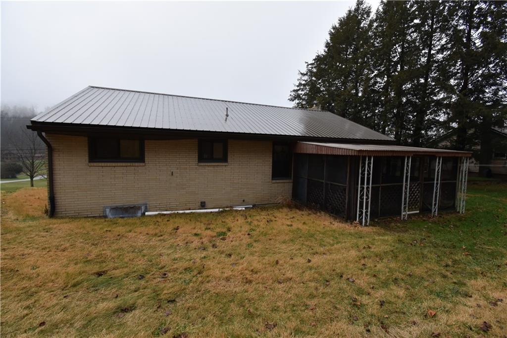485 North Ben Franklin Road Indiana, PA 15701 - Photo 3 of 13 a view of a house with a large window and wooden fence