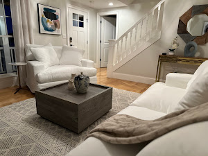 28 Beach Road Oak Bluffs, MA 02557 - Photo 12 of 32 a living room with couches and a potted plant
