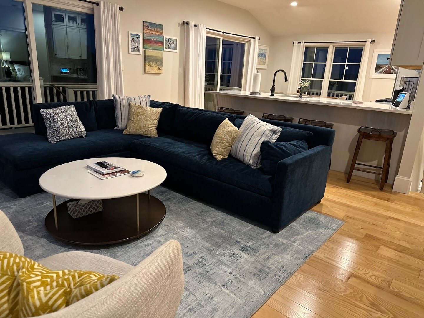28 Beach Road Oak Bluffs, MA 02557 - Photo 15 of 32 a living room with furniture and a wooden floor