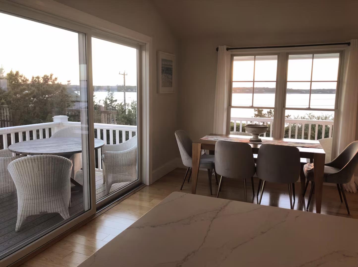 28 Beach Road Oak Bluffs, MA 02557 - Photo 21 of 32 a view of a dining room with furniture window and outside view