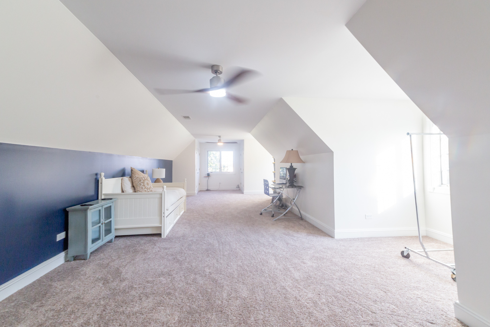 24131 Volbrecht Road Crete, IL 60417 - Photo 27 of 50 a living room with furniture and a chandelier