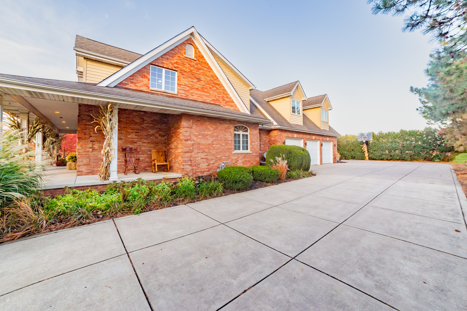 24131 Volbrecht Road Crete, IL 60417 - Photo 44 of 50 a front view of a house with garden