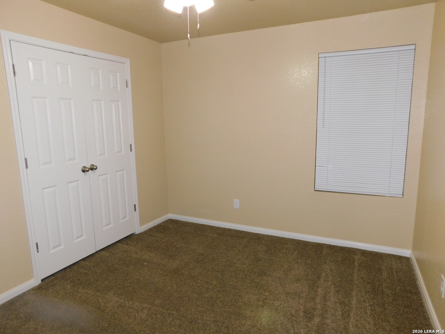 8710 8th Street, Unit 2 Converse, TX 78109 - Photo 15 of 18 an empty room with a empty space and a window