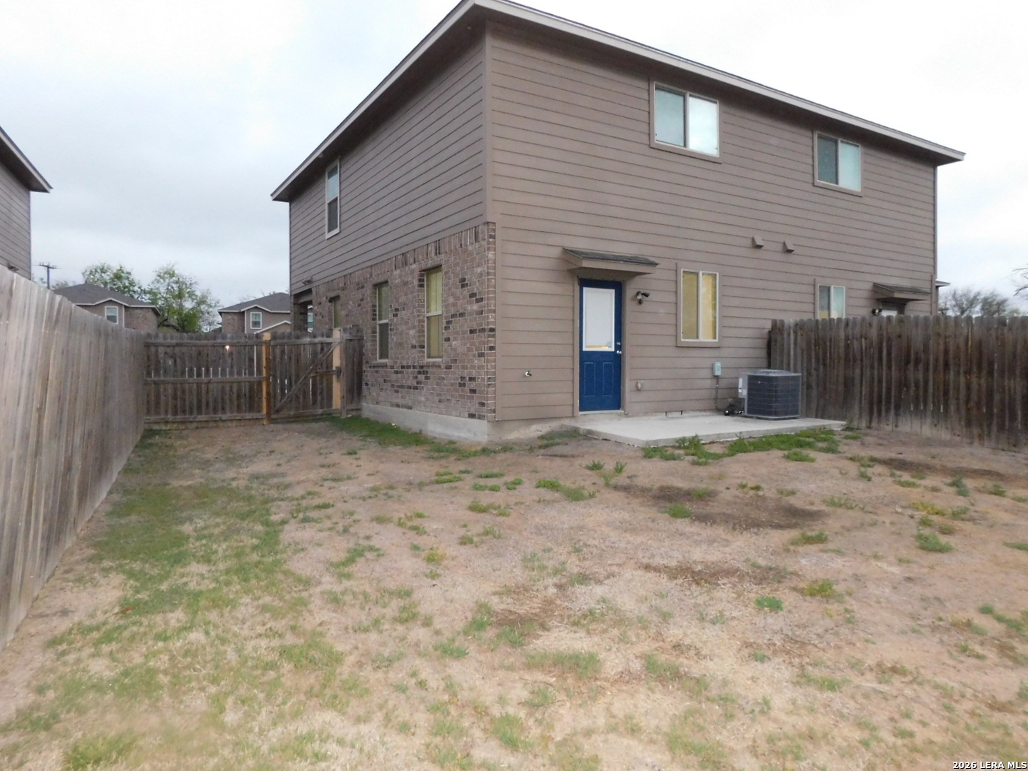 8710 8th Street, Unit 2 Converse, TX 78109 - Photo 18 of 18 a view of a house with a backyard