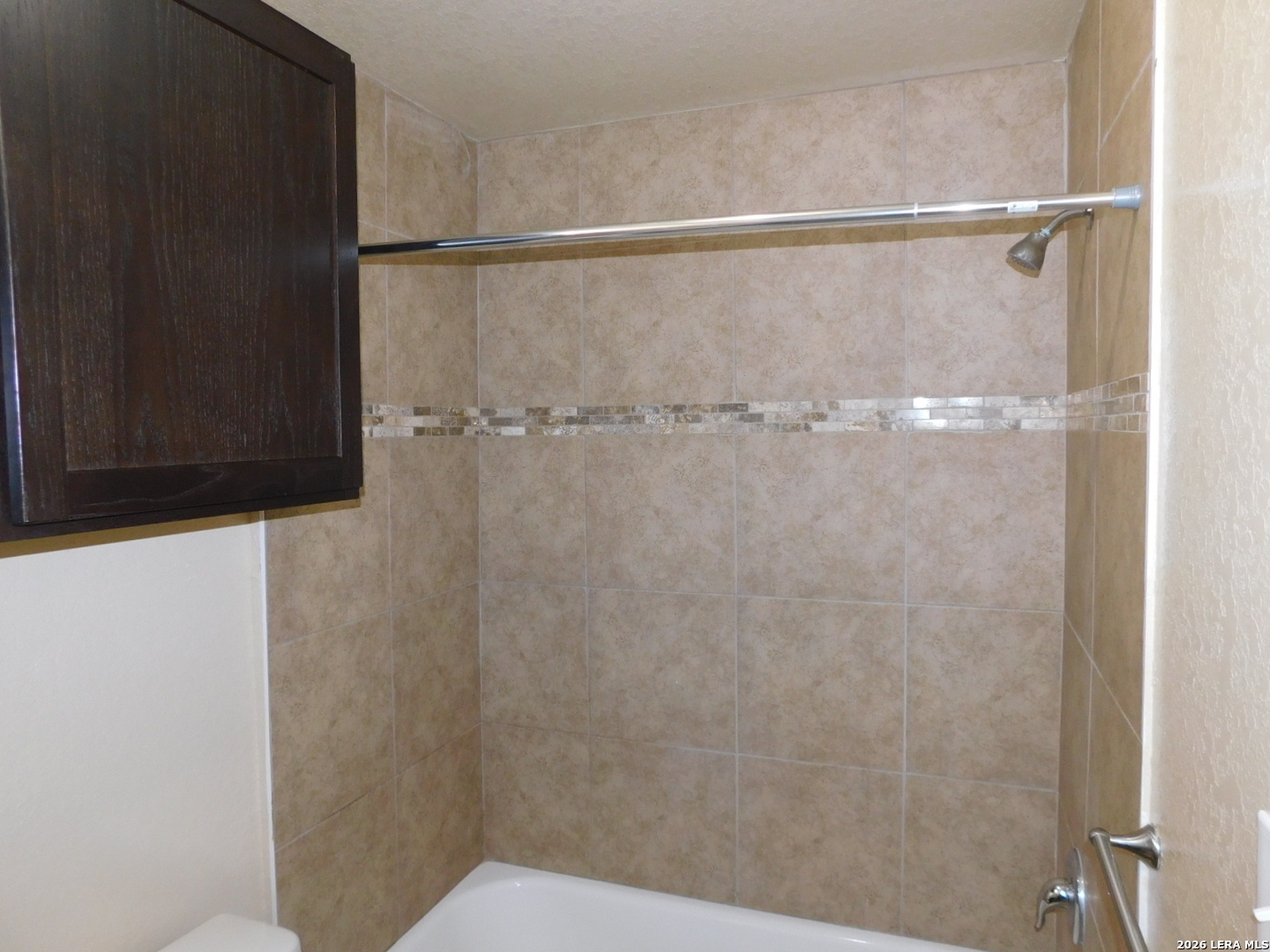 8710 8th Street, Unit 2 Converse, TX 78109 - Photo 10 of 18 a bathroom with a shower