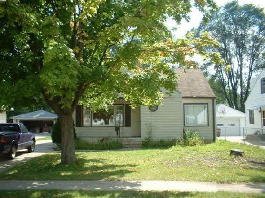1916 Raismore Road Rockford, IL 61108 - Photo 1 of 1 front view of a house with a yard