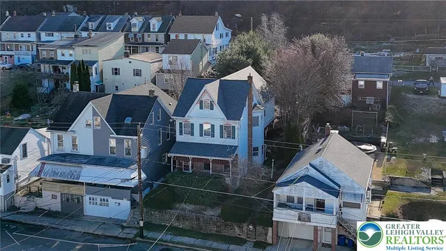 an aerial view of multiple houses
