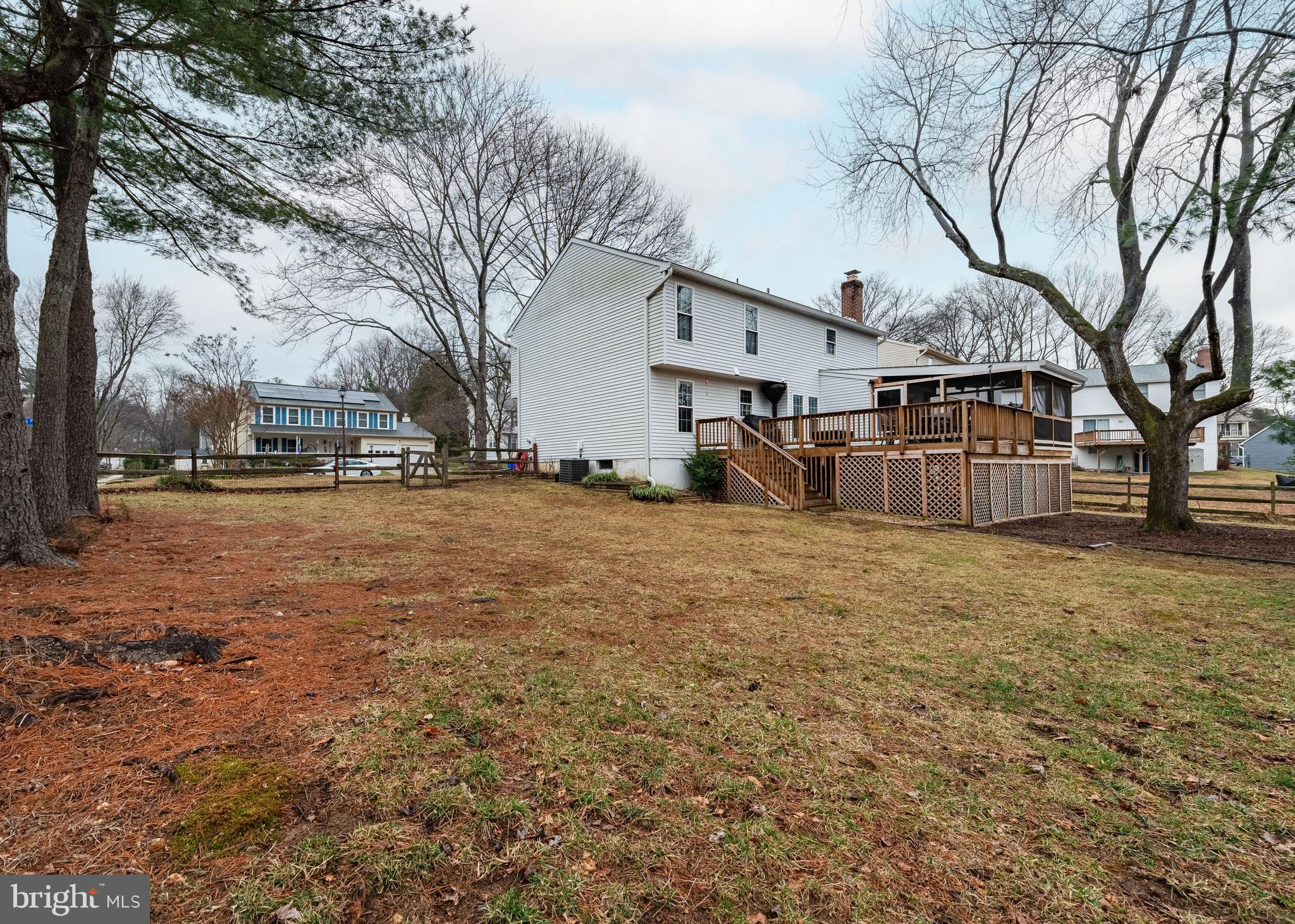 7202 Single Wheel Path Columbia, MD 21046 - Photo 29 of 30 a view of a yard covered with snow and trees