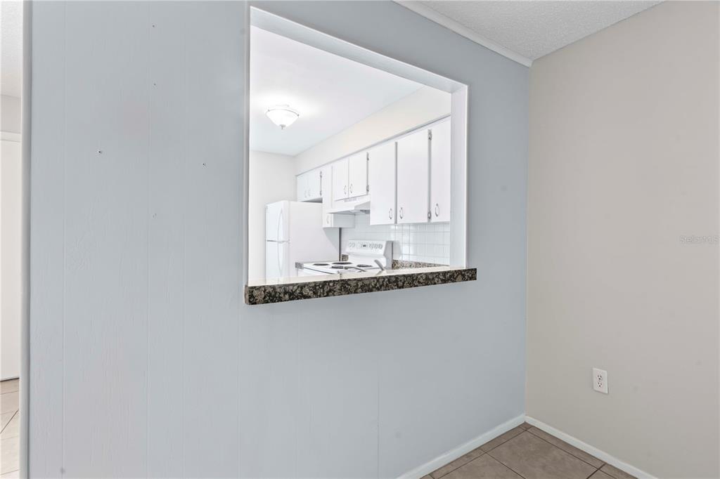 11511 113th Street, Unit 4F Largo, FL 33778 - Photo 13 of 30 a bathroom with a sink and a mirror