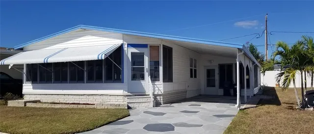 a view of house with patio