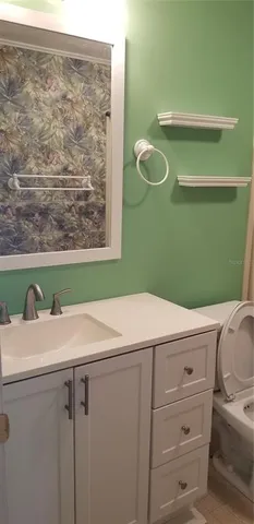 a bathroom with a toilet and a bathtub