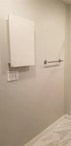 a view of a field with a tree