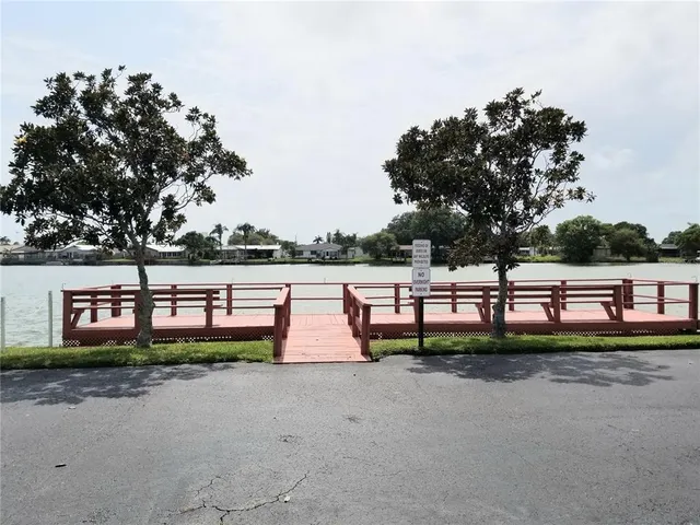 a view of wooden floor with a lake