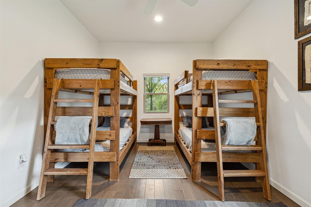 7342 Briar Road Azle, TX 76020 - Photo 20 of 40 Bunk-room with tall ceilings and a custom walk-in closet