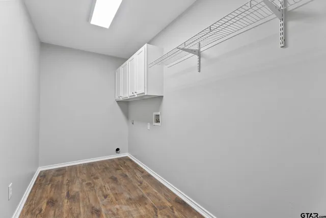 a view of a room with racks on the wall